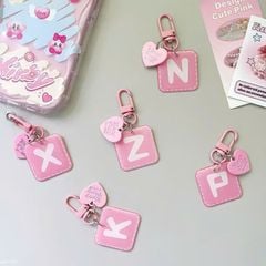 ** Móc khóa mica chữ hồng