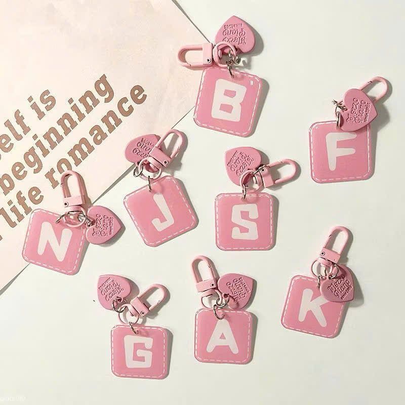 ** Móc khóa mica chữ hồng