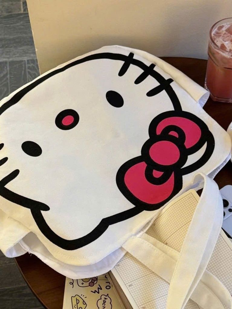 ** Túi đeo vai trắng đầu Kitty lớn