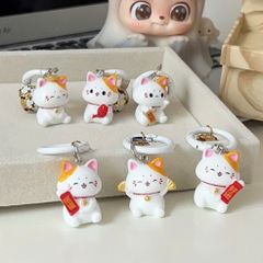 ** Móc khóa mini mèo phát tài