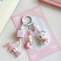 ** Móc khóa chùm Kitty váy hồng nơ hồng