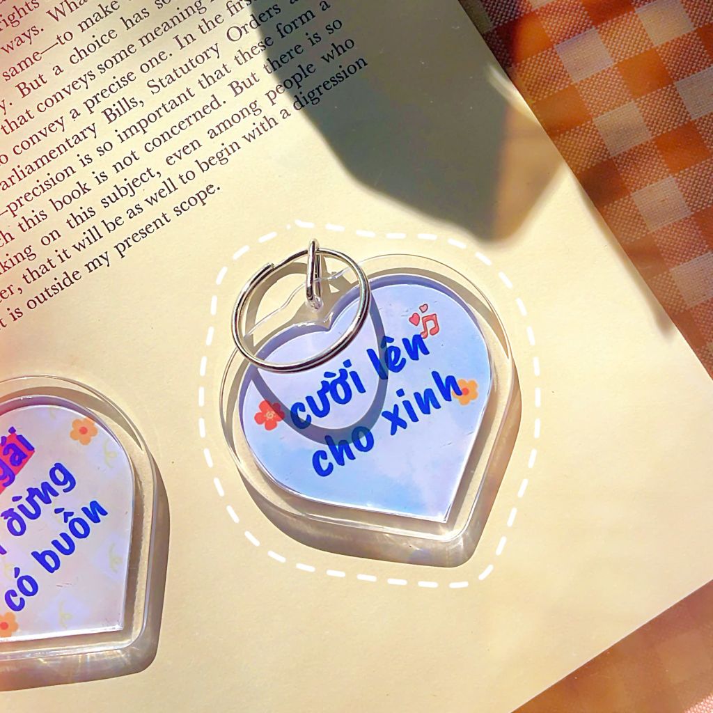 ** Móc khóa mica in câu nói động lực