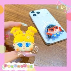** Popsocket cô gái tóc vàng