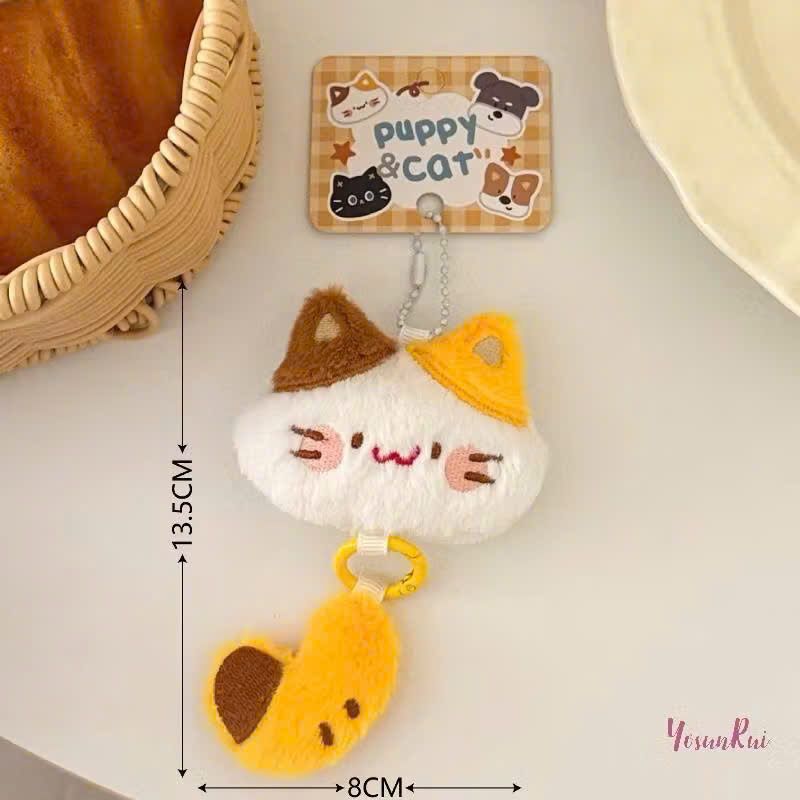 ** Móc khóa bông mèo/cún tách đuôi