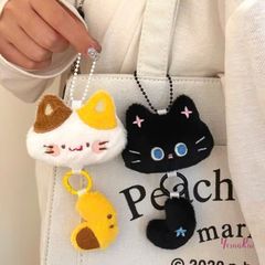 ** Móc khóa bông mèo/cún tách đuôi