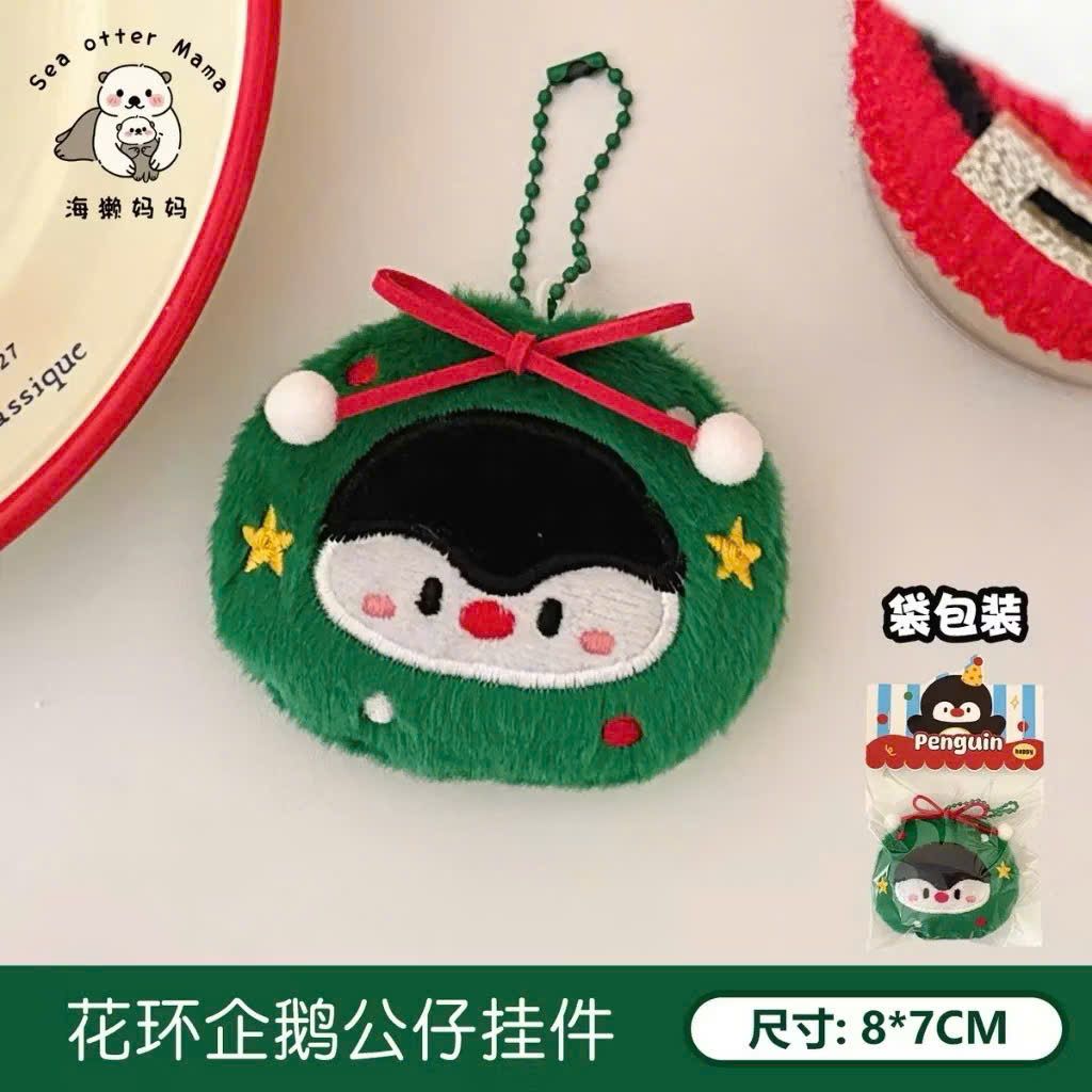 ** Móc khóa bông mặt chim cánh cụt