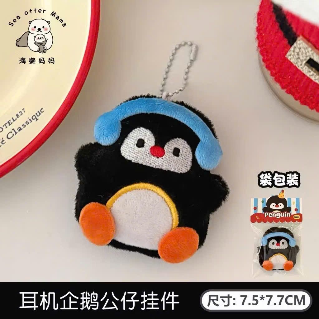 ** Móc khóa bông mặt chim cánh cụt