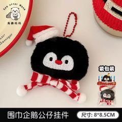 ** Móc khóa bông mặt chim cánh cụt