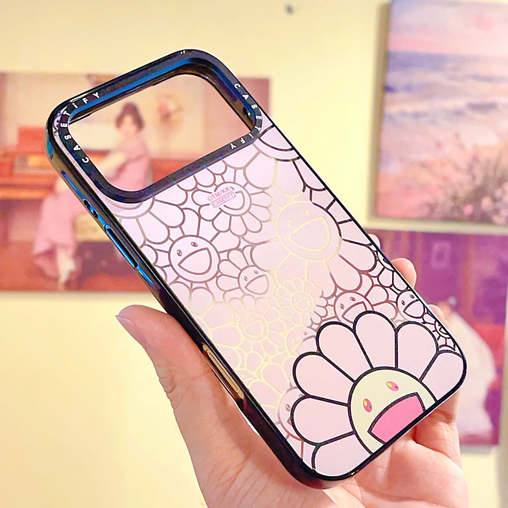 ** Ốp IP 17 Pro Max hoa mặt cười hồng