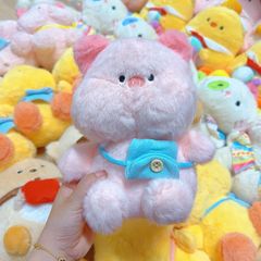 ** Gấu bông heo hồng đeo túi vàng/xanh