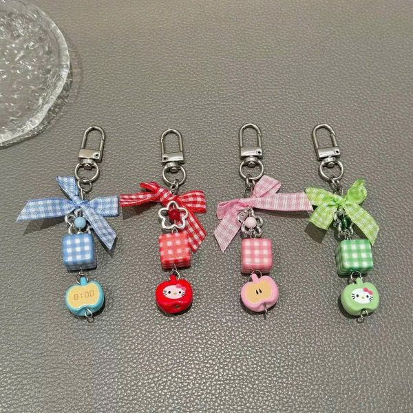 ** Móc khóa táo xúc xắc nơ ca rô đỏ/xanh/hồng