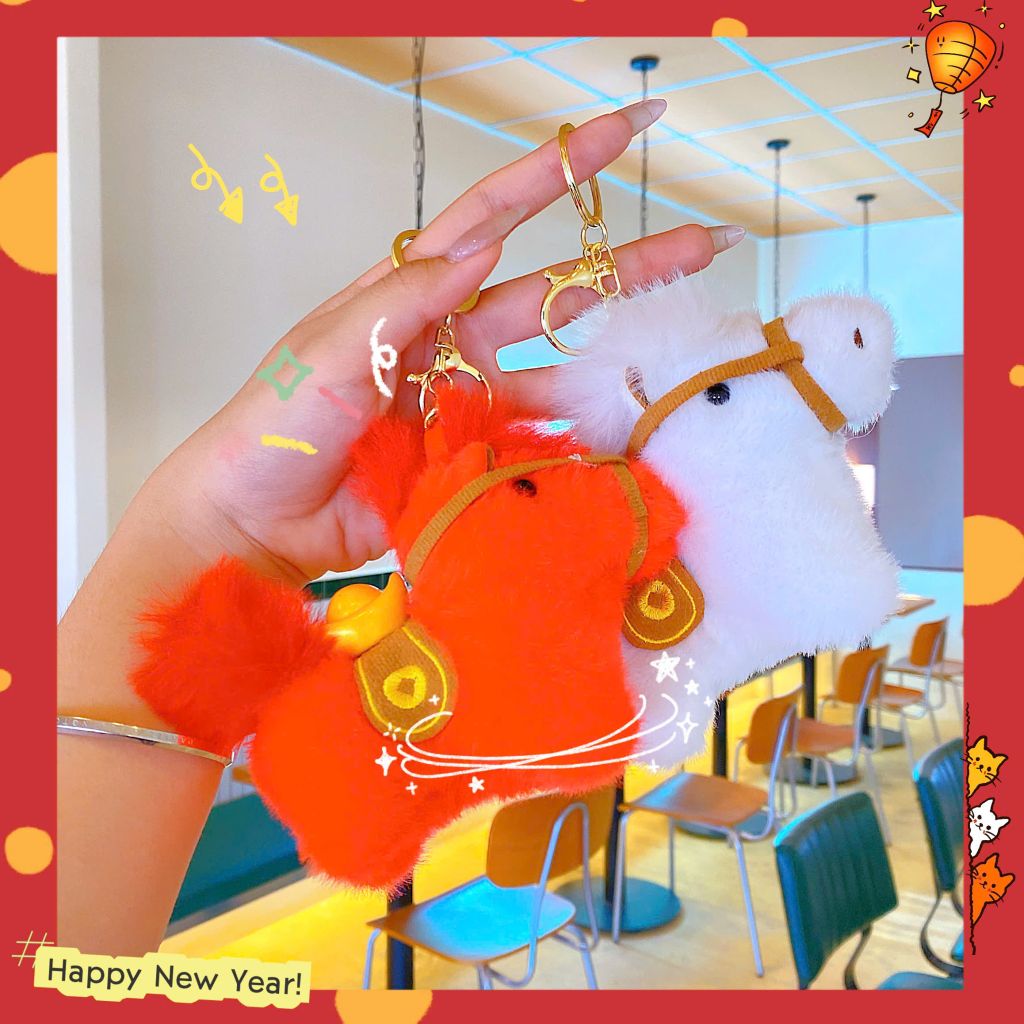 ** Móc khóa bông ngựa cõng thỏi vàng