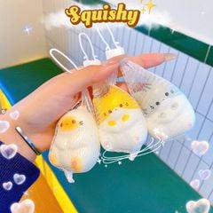 ** Squishy mèo nghiêng đầu