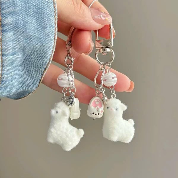 ** Móc khóa lạc đà trắng charm dép mặt Kitty