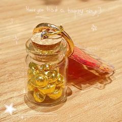 ** Móc khóa hủ vàng và thẻ mica nhiều hình