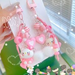 ** Móc khóa chùm Kitty hồng charm bông