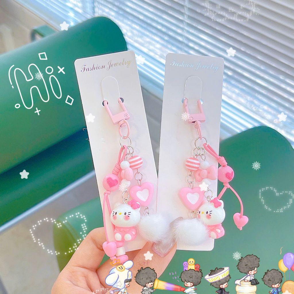 ** Móc khóa chùm Kitty hồng charm bông