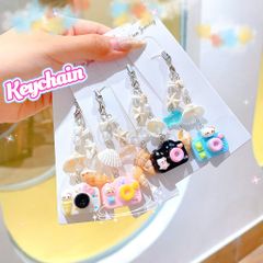 ** Dây đeo điện thoại vỏ sò máy ảnh nhiều màu