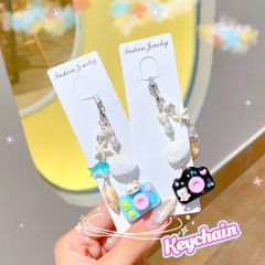 ** Dây đeo điện thoại vỏ sò máy ảnh nhiều màu