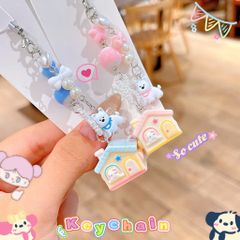 ** Dây đeo điện thoại cún trắng ngôi nhà mái hồng/xanh