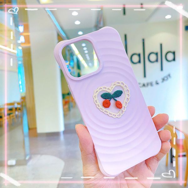 ** Ốp IP 16 Pro Max silicon vân sóng tròn đính cherry tim ren