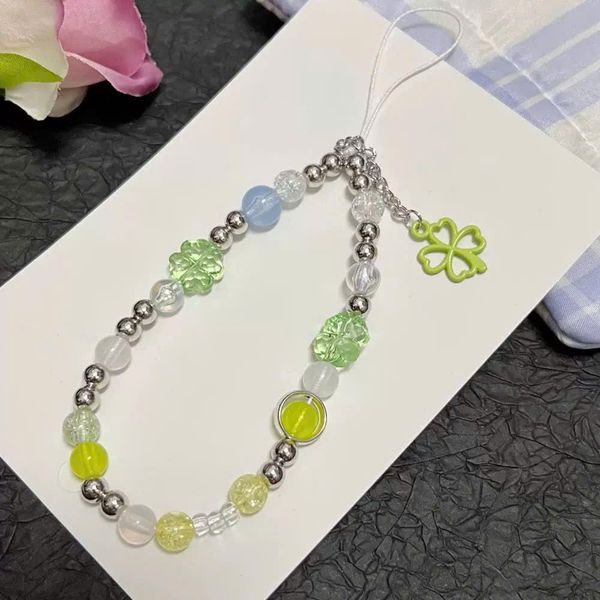 ** Dây đeo điện thoại chuỗi hạt cỏ bốn lá tone xanh lá