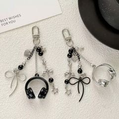 ** Móc khóa headphone đen/bạc mix nơ bạc