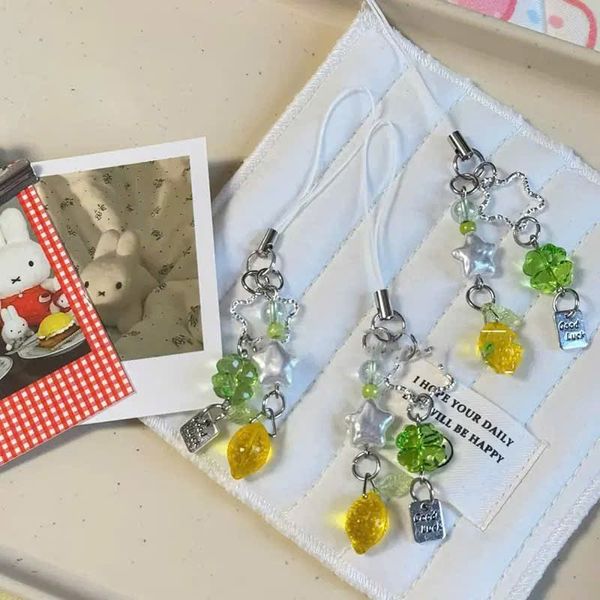 ** Dây đeo điện thoại cỏ bốn lá/ngôi sao/ quả xoài