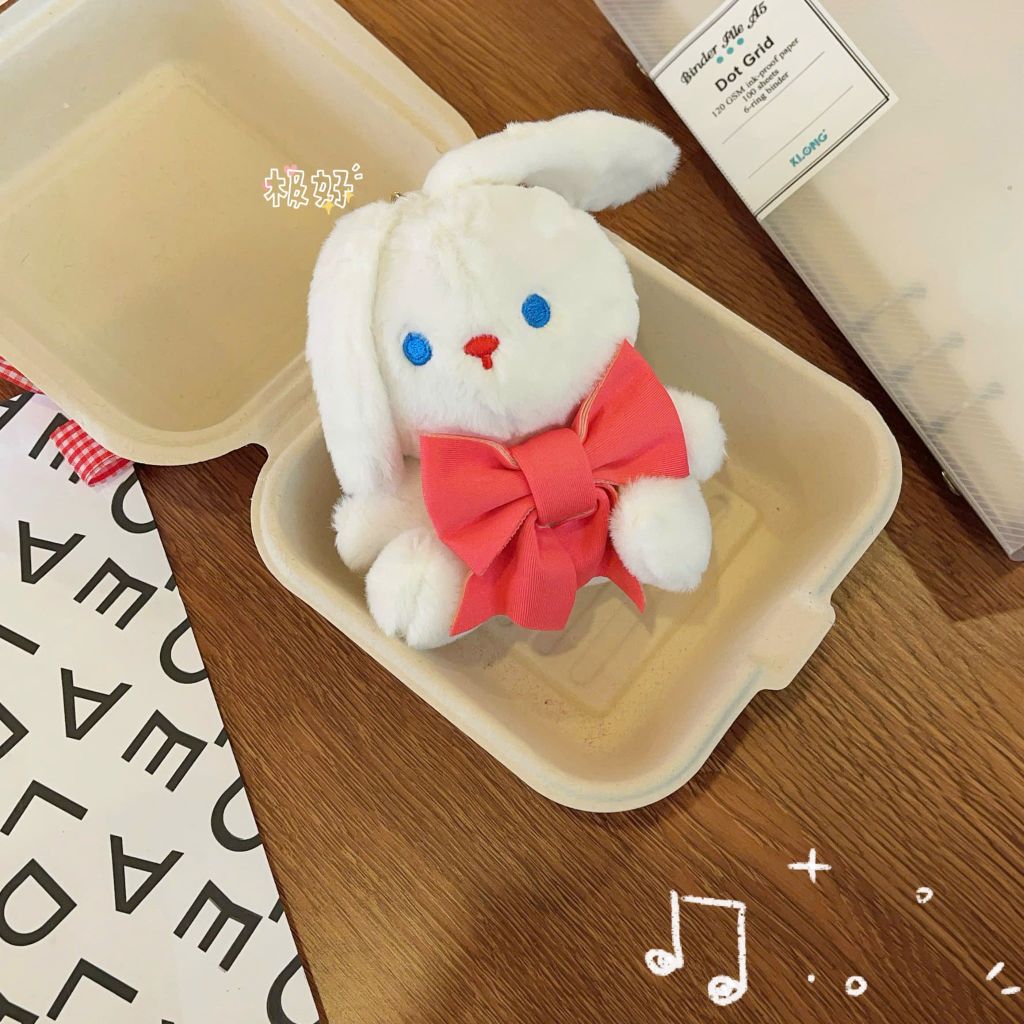 ** Móc khóa bông thỏ trắng nơ hồng/xanh