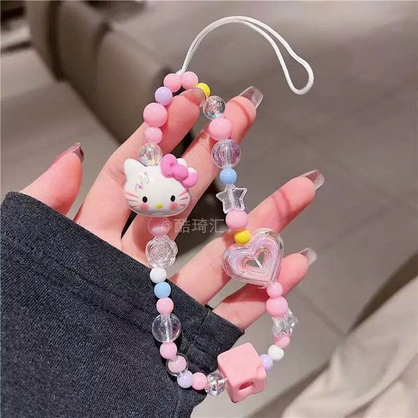 ** Dây đeo điện thoại chuỗi Kitty nơ hồng charm tim