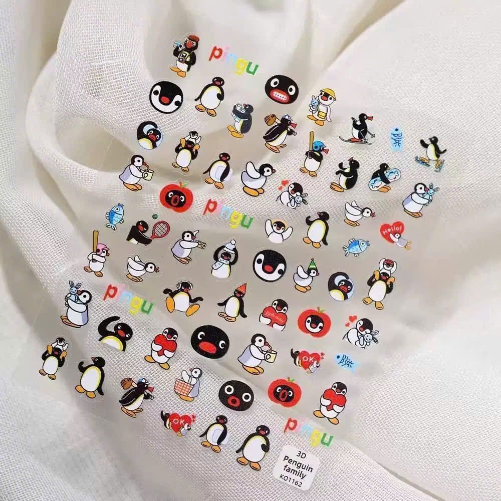 ** Sticker nổi nhiều hình Kitty/nơ/cánh cụt/tim