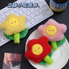 ** Móc khóa bông hoa mặt vàng
