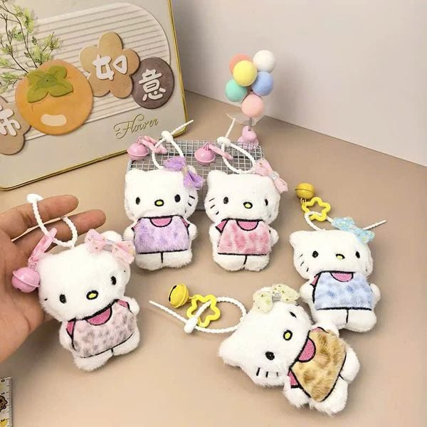 ** Móc khóa bông Kitty áo da beo