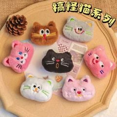 ** Móc khóa bông mặt mèo liếc nhiều màu
