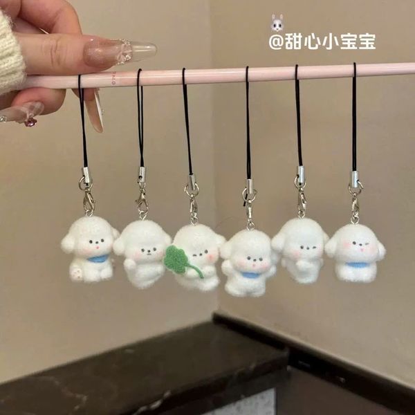 ** Dây đeo điện thoại cún trắng phủ lông cỏ 4 lá/yếm xanh