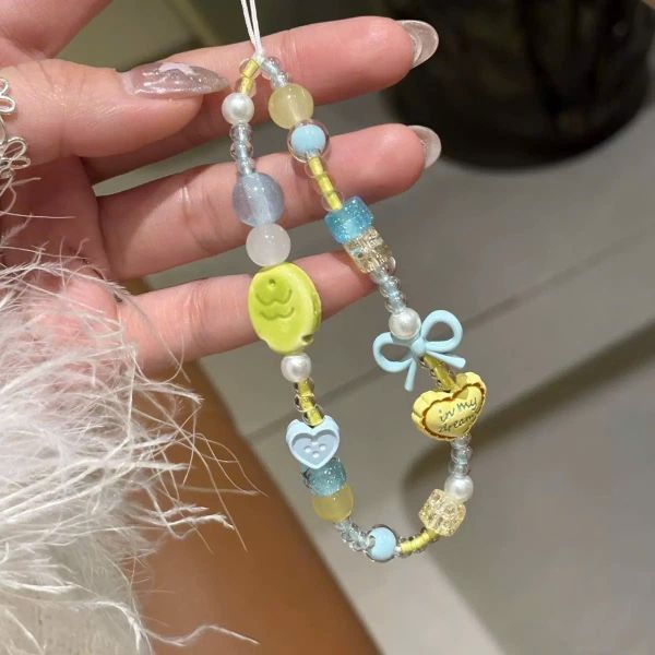 ** Dây đeo điện thoại cá xanh tim vàng in my dream