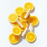  Son dưỡng môi có màu Chống nắng bảo vệ môi THE FACE SHOP Vitamin Sun Lip Balm 3.9g 