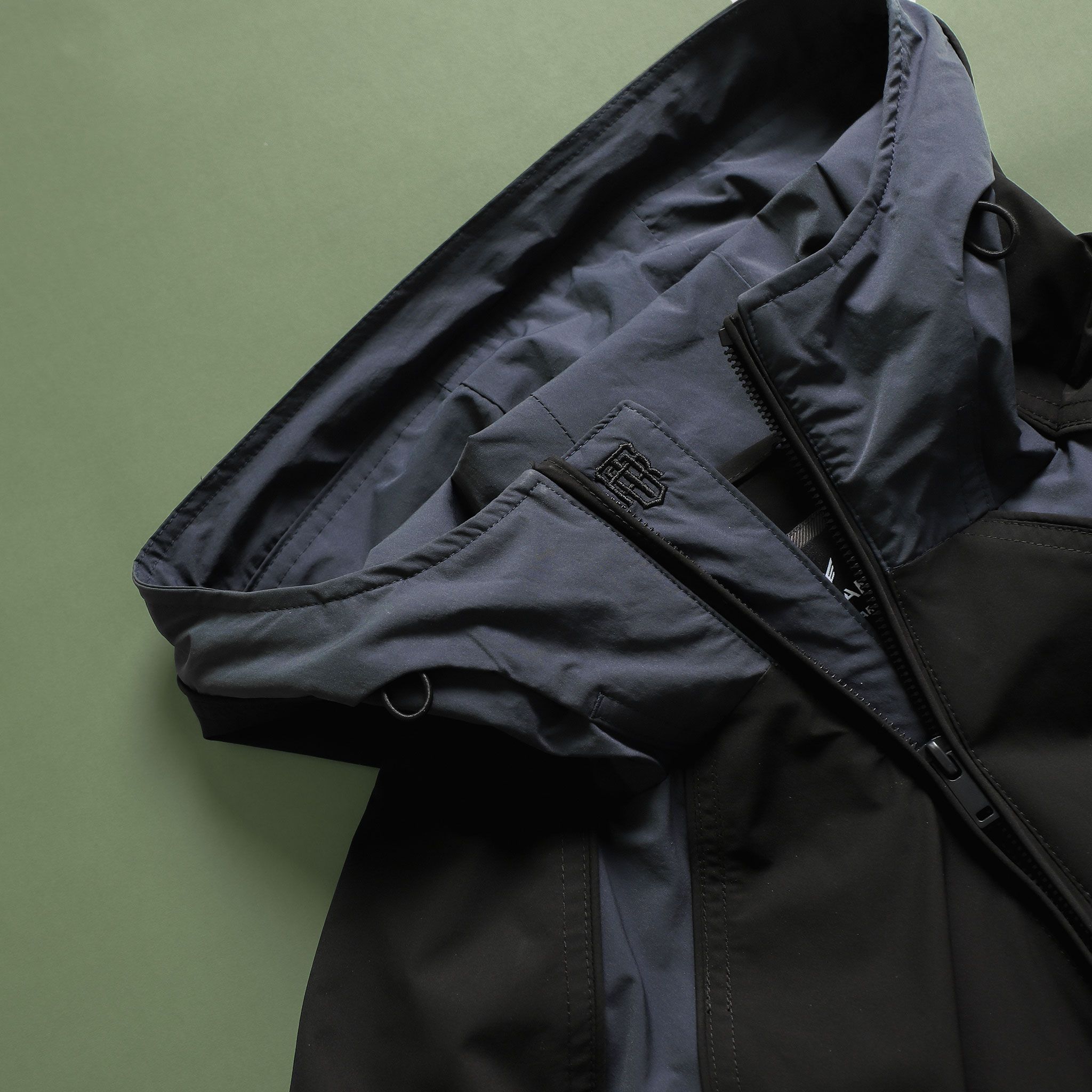  Áo khoác gió 2 lớp can phối mũ liền logo thêu GWCW801 