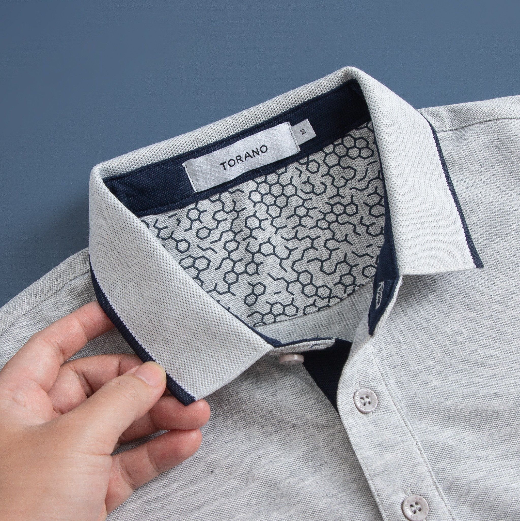  Áo polo trơn bo kẻ in logo Torano ngực GSTP845 
