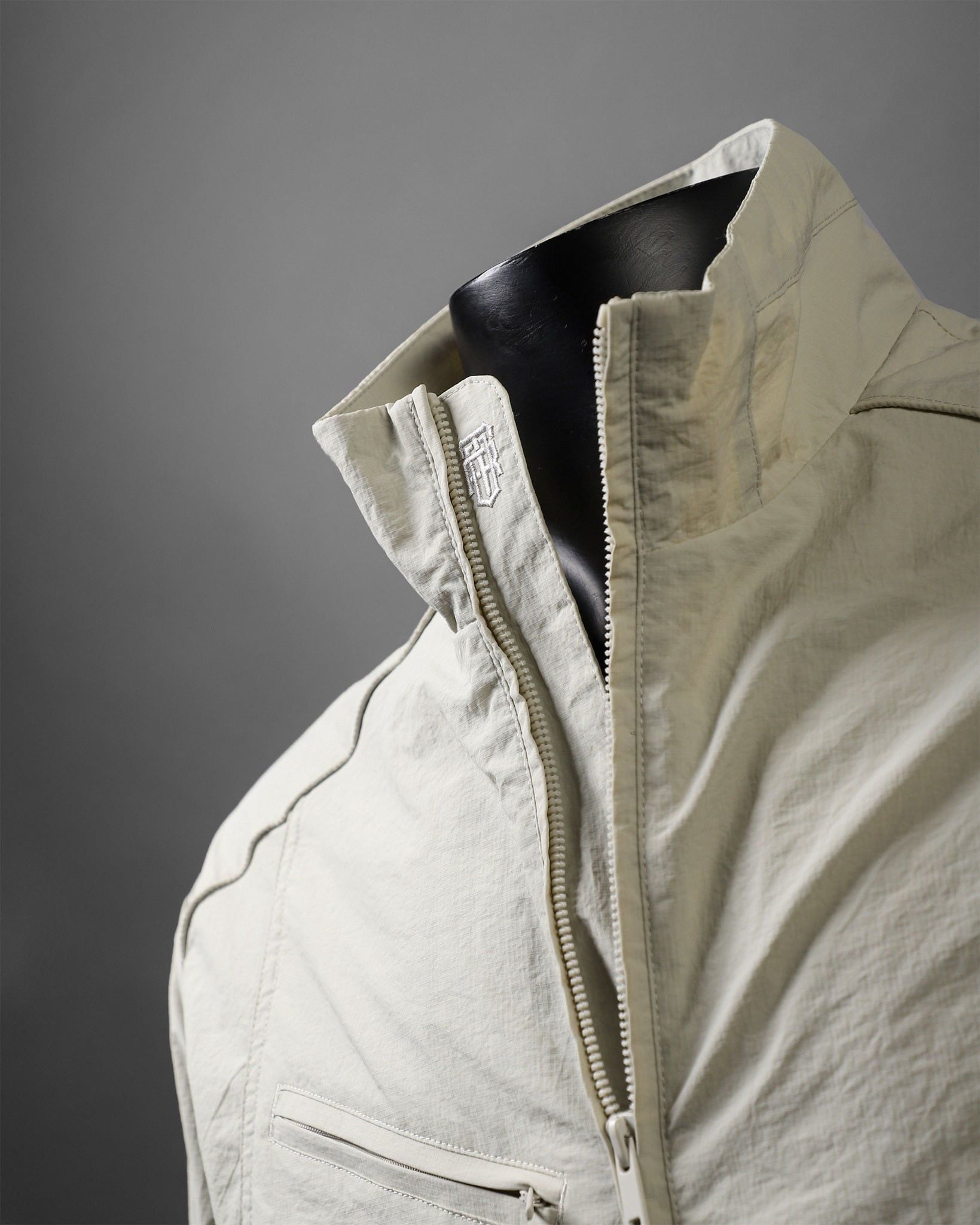  Áo khoác gió 2 lớp relaxedfit cổ cao logo thêu GWCW805 