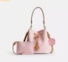 Túi Đeo Vai Coach Rowan Bucket Bag In Signature Canvas With Charms Powder Pink CEA23