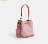  Túi Đeo Vai Coach Rowan Bucket Bag In Signature Canvas With Charms Powder Pink CEA23 