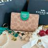 Ví Coach Medium Corner Zip Wallet In Signature Canvas