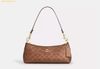 Túi Đeo Vai Coach Charlotte Shoulder Bag In Signature Canvas CCL40 Brown