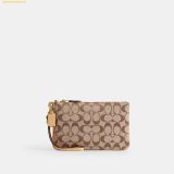  Ví Dài Coach Essential Small Wristlet In Signature Jacquard Khaki Light Peach CER36 