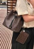  Túi Bucket Coach Rowan Bucket Bag In Signature Canvas Dark Brown 