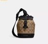 Túi Đeo Chéo Coach Hudson Small Pack Signature Canvas CB928