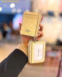  Ví Thẻ Coach Zip Card Case In Signature Canvas Màu Vàng Nhạt 