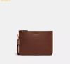  Túi Cầm Tay Coach Charter Pouch leather C6694 