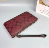  Ví Dài COACH Large Corner Zip Wristlet In Signature Canvas 